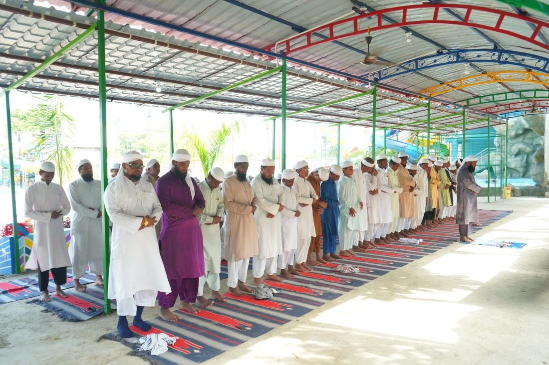Congregational prayer during the trip